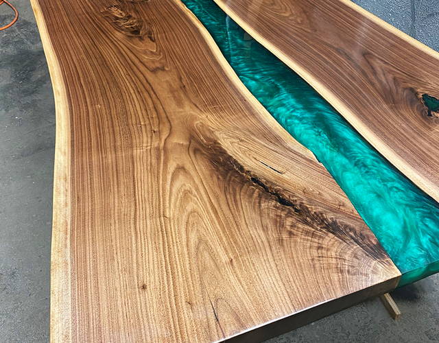 emerald green live edge walnut epoxy river table