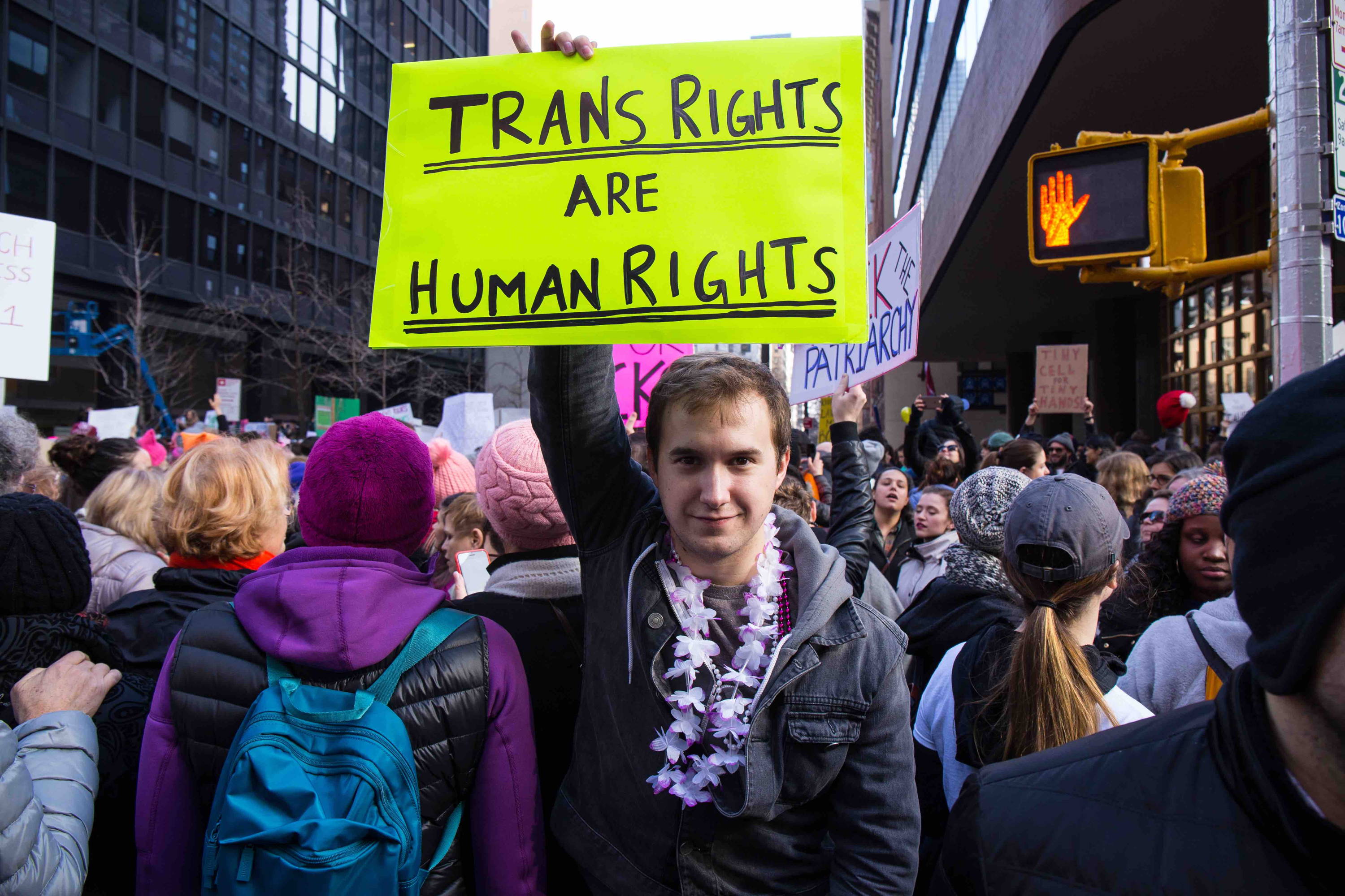 Trans campaigner with placard