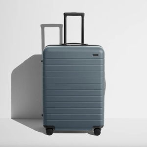 The Medium suitcase color: Coast Blue | Away
