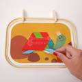 Father and daughter playing with the Montessori Twist and Match Puzzle.
