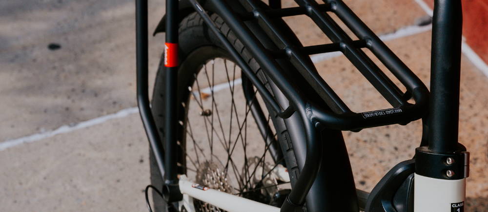 The back tire an rack on an e-Bike