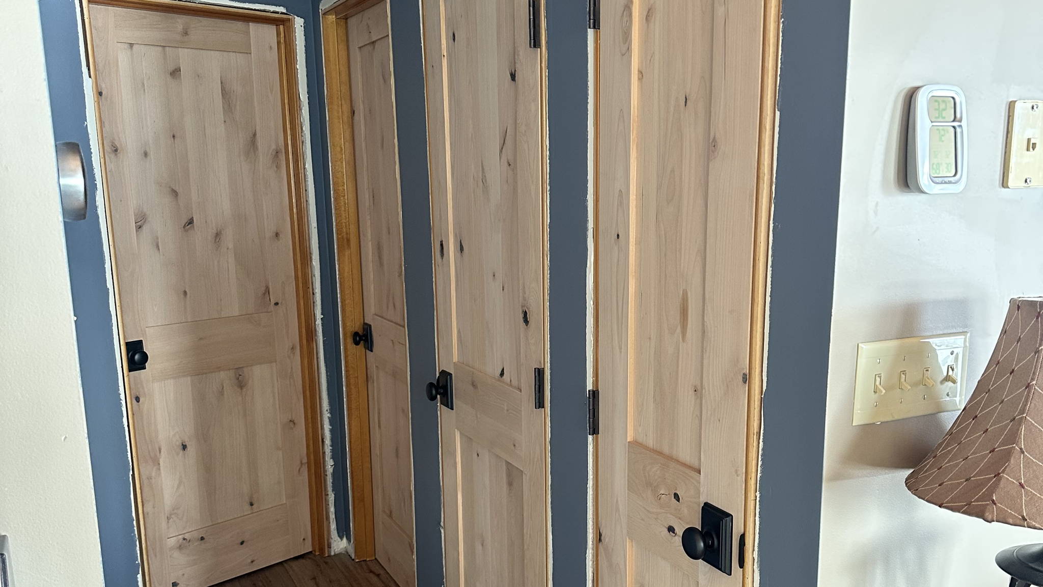 Big Change with 8 Two-Panel Knotty Alder Doors in Laconia NH Home | One ...