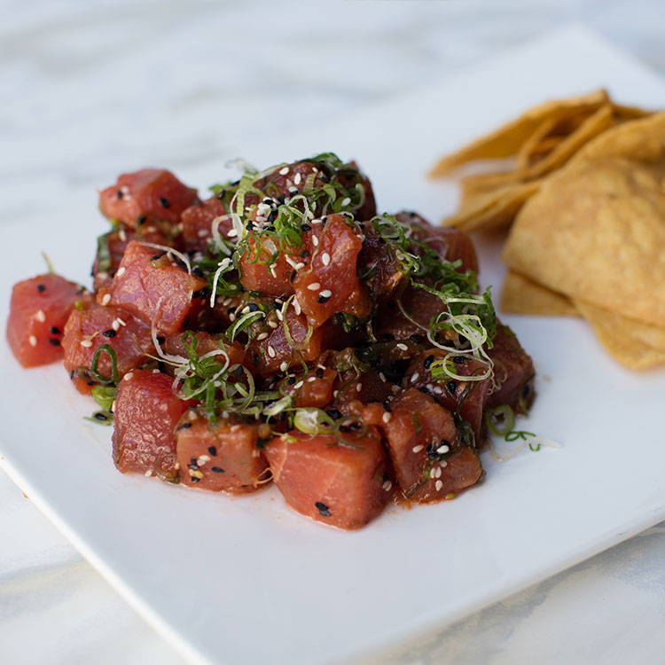 Our Famous Fresh Ahi Poke with a side of Tortilla Chips