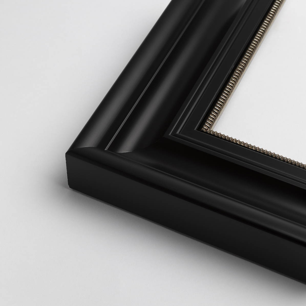 TV-Mirror Contemporary Black Frame with Pattern Inner by FRAMING TO A T