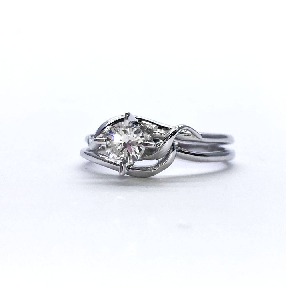 Solitaire custom ring with medieval style in white gold