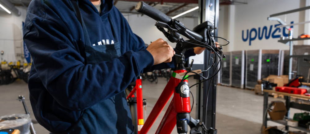 Upway mechanic servicing Gazelle electric bike