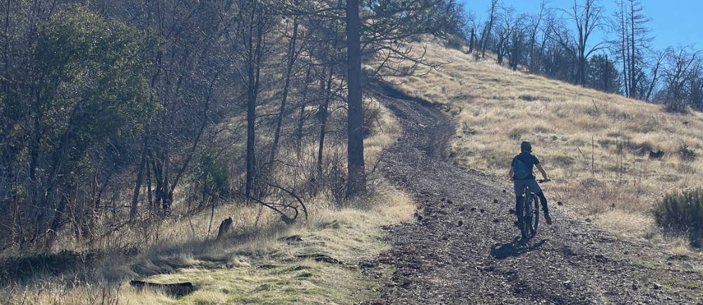 Riding up Feliciana Mountain Road offers stunning views of the Sierra Nevada