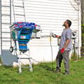 Lifting up shingles with a Safety Hoist electric hoist