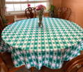 st. patrick's day tablecloth over a round table