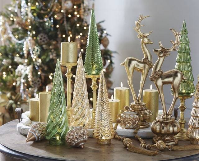 raz imports glass Christmas trees and gold candlesticks and reindeer