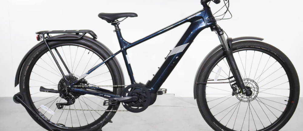 a blue Cannondale Tesoro Neo X 2 electric city bike