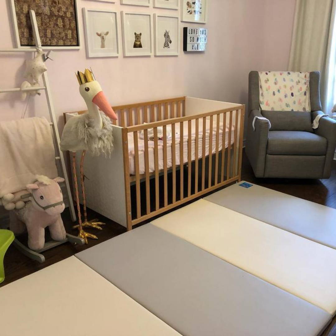 AlZiP playmat in neutral nursery for baby