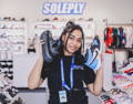 soleply smiling employee in store
