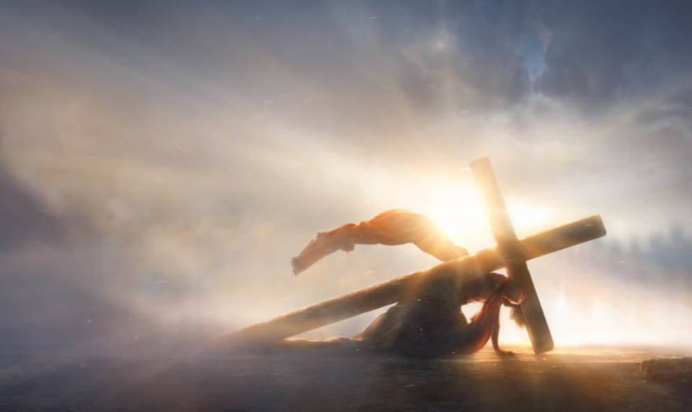 Jesus collapsing under the the weight of the cross.