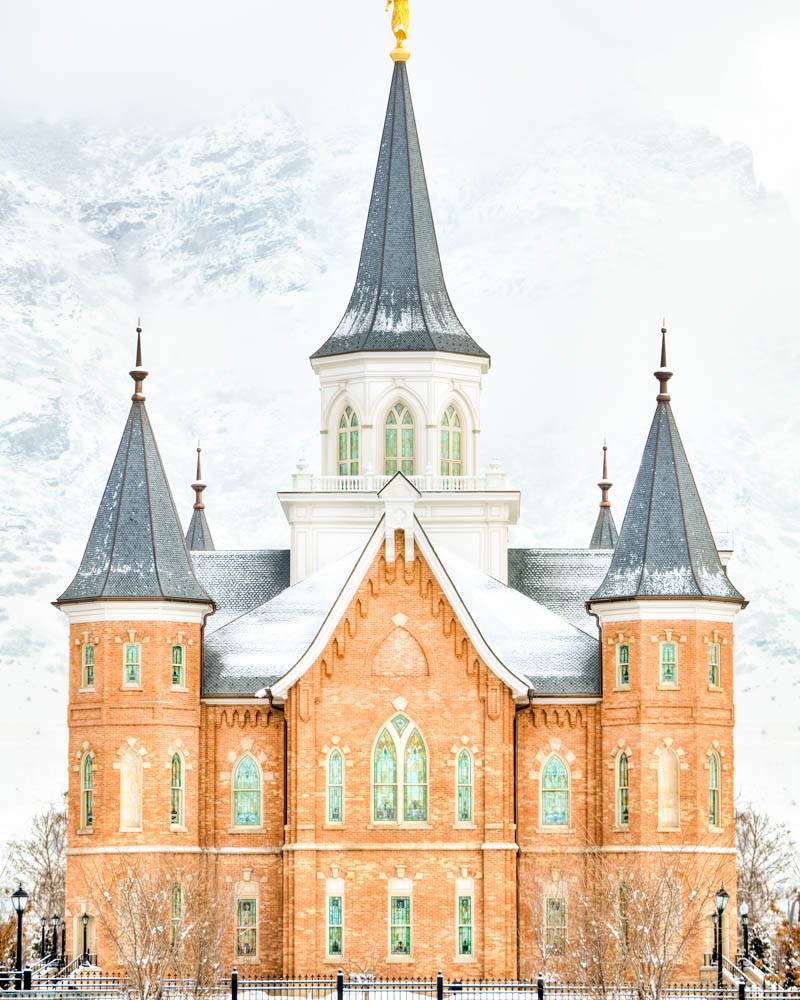 Picture of Provo City Center Temple standing int he snow.