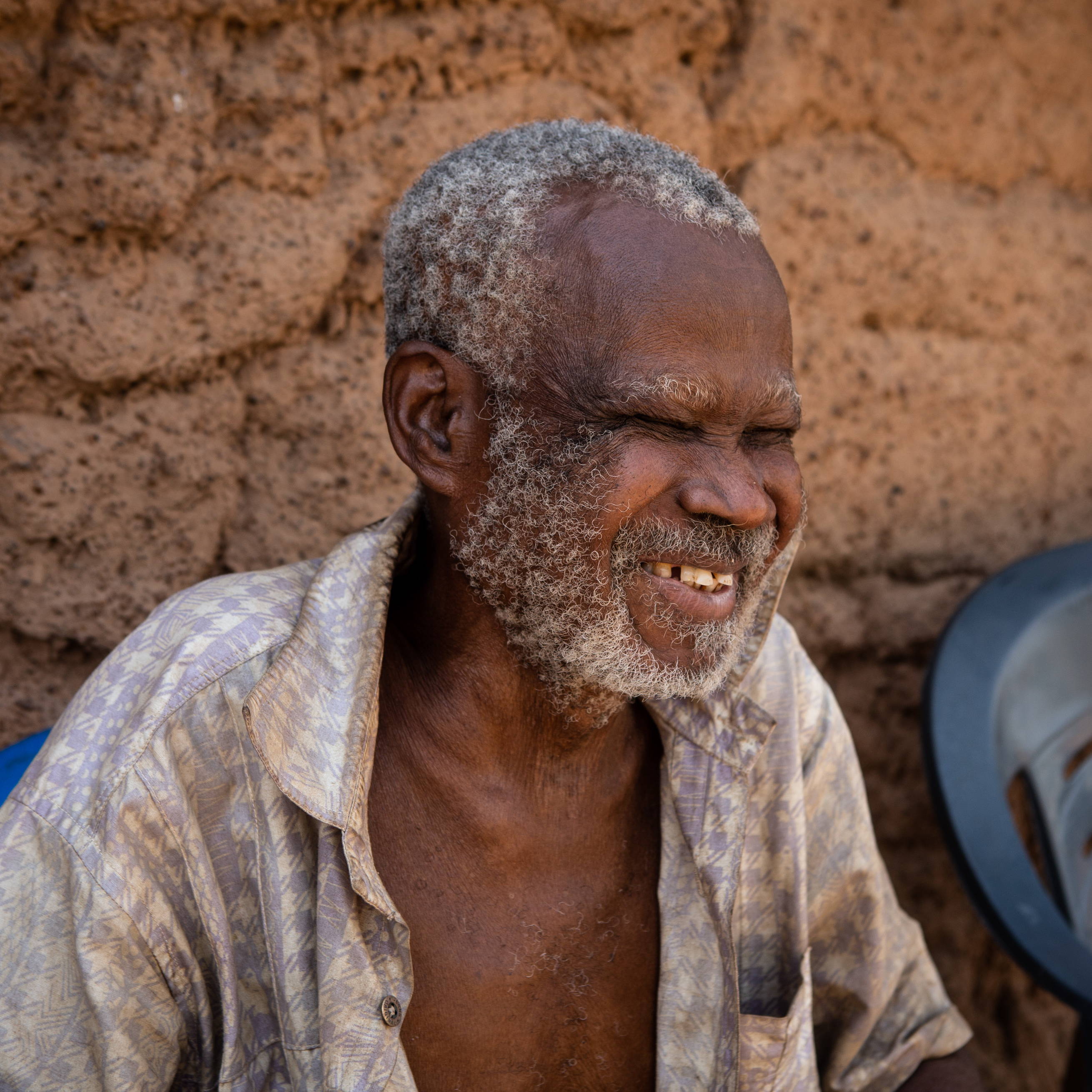 Emmanuel lives in Asubende, he became blind from onchocerciasis at a young age.