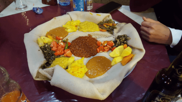 Ethiopian food: unfamiliar to the IOHK team and the Ugandan students