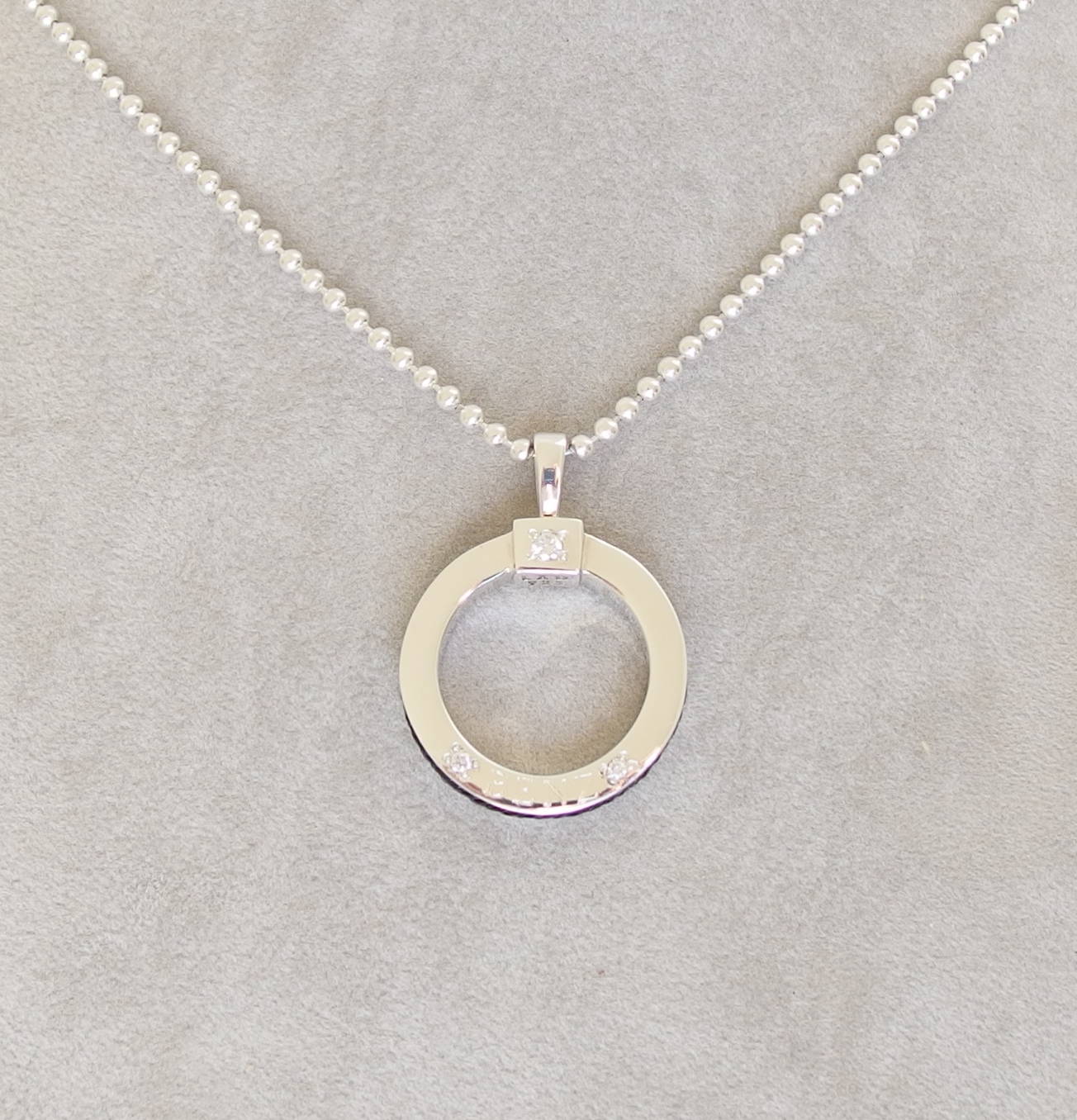 Keystone pendant with diamond and inset with horse hair