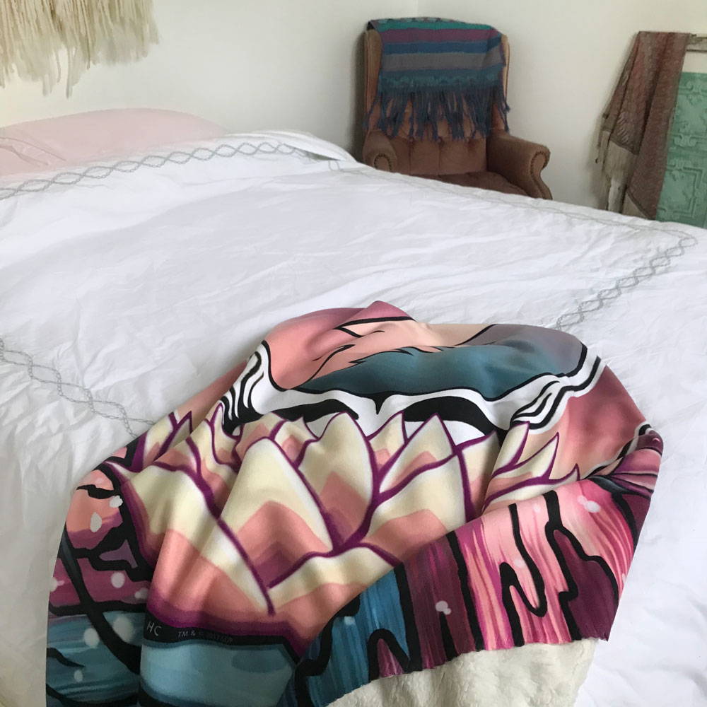 Lotus Sherpa Blanket on bed