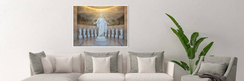 Photo of Jesus and the twelve apostles statues hanging above a sofa.