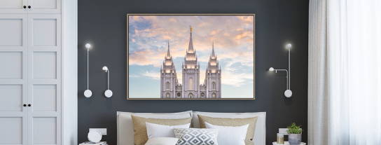 Salt Lake City Temple picture hanging above a bed.