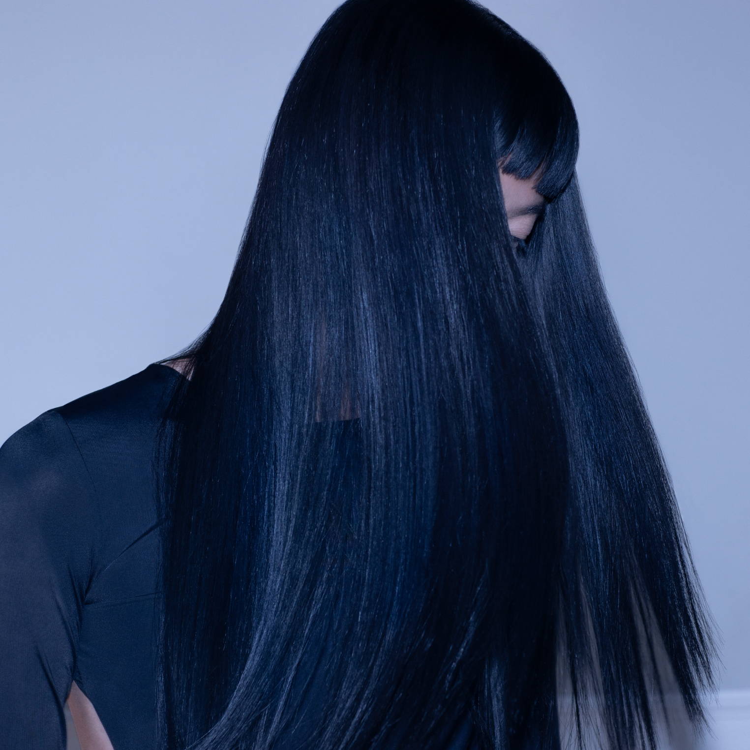 Davines hair model with sleek dark hair