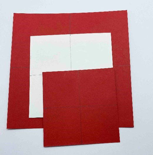 Three pieces of square card to make a frame, the largest card is red, the medium card is white, and the smallest card in red