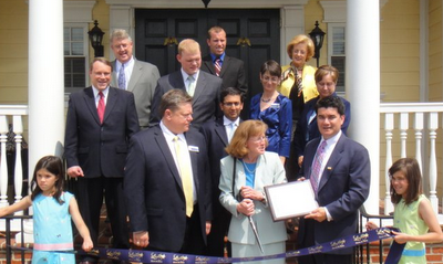 Quadruple breakaway Southern-style: After getting set up in an historic Leesburg building, the Mayor was invited for a ribbon cutting.