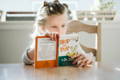 Little girl reading a book. 