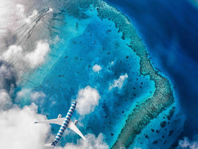Image may contain: Nature, Outdoors, Sea, Water, Coast, Shoreline, Aircraft, Airliner, Airplane, Transportation, and Vehicle