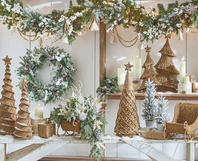 raz imports Christmas decor rattan trees and sled with lush greenery