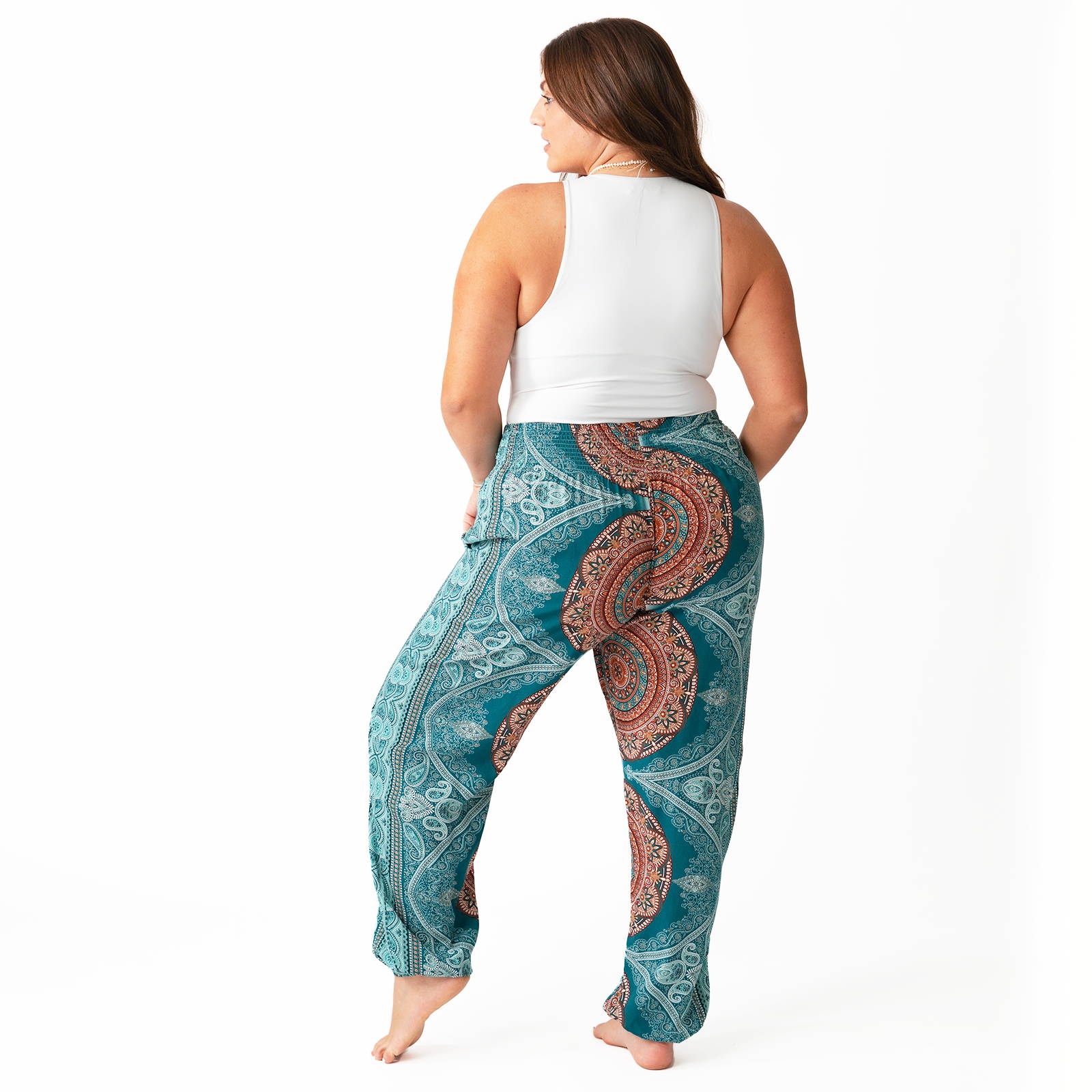 Back View of a Woman in Teal and Orange Harem Pants