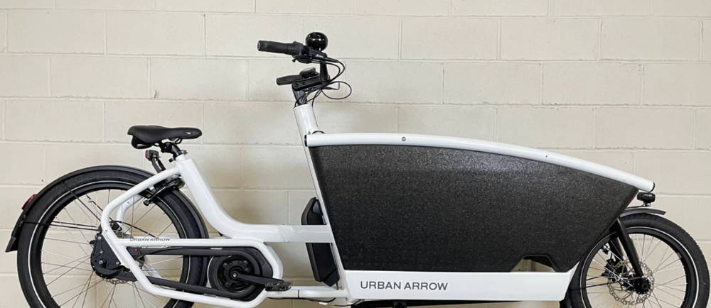 an Urban Arrow Family front loader electric cargo bike