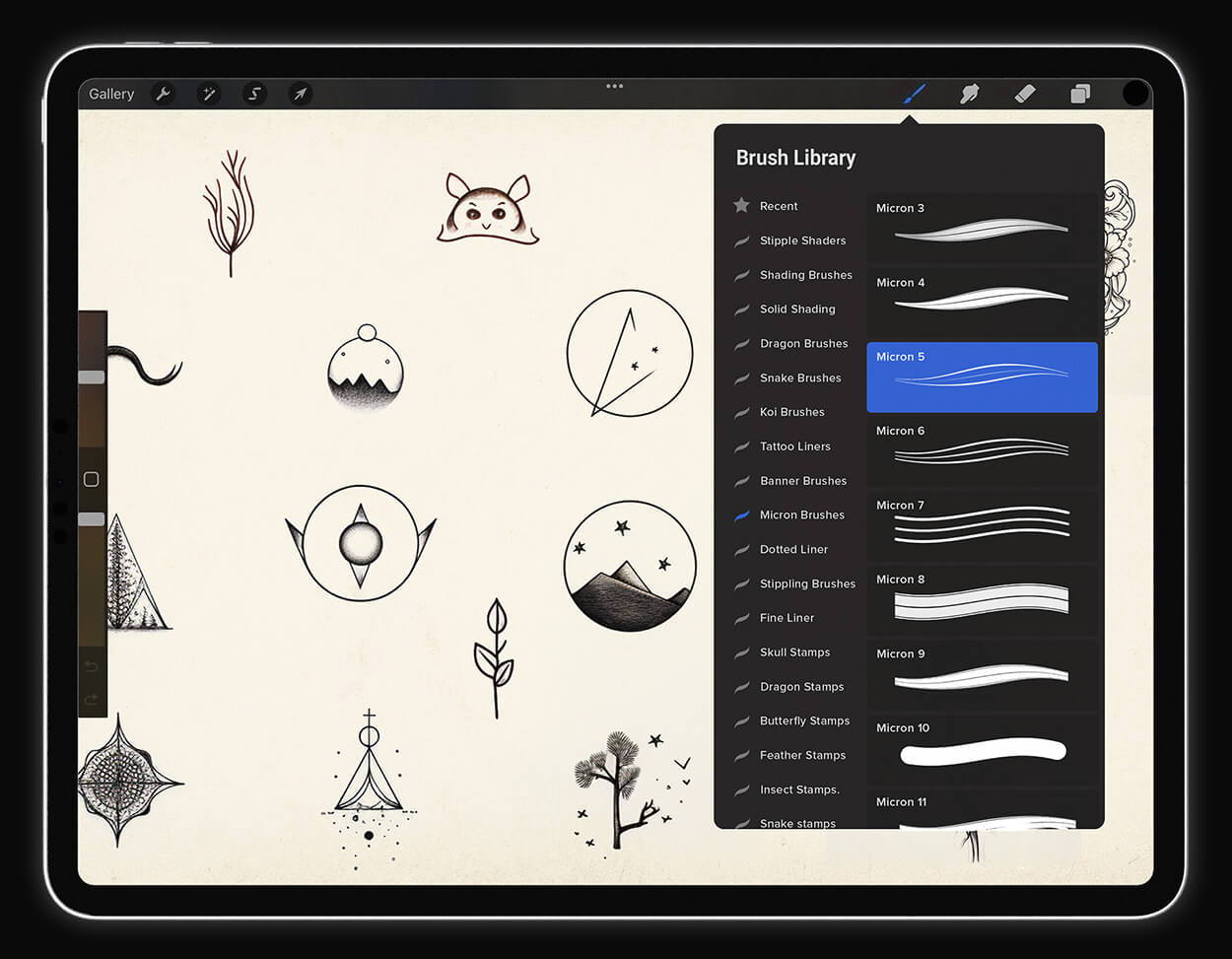 image of multiple linework flash tattoos on an iPad with micron brush examples