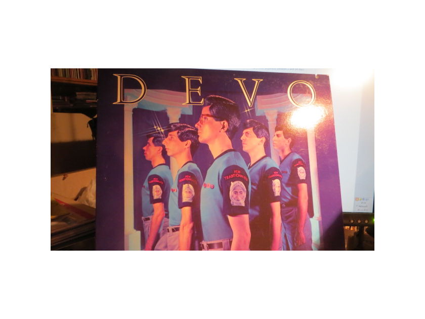 DEVO - NEW TRADITIONALIST POSTER INCLUDED w 45