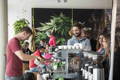 Barista at coffee catering with unbound coffee roasters