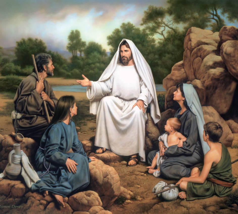 Jesus sitting next to a river teaching a group of people.