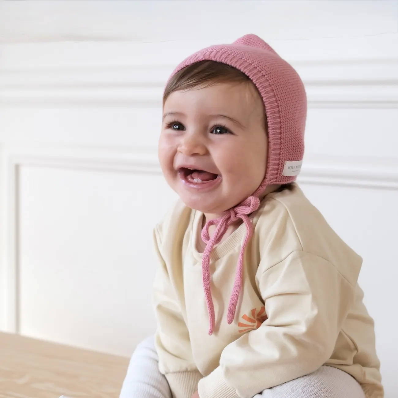 Poncho de bain enfant en coton bio certifié GOTS avec capuche, tissu éponge doux et absorbant rose beige