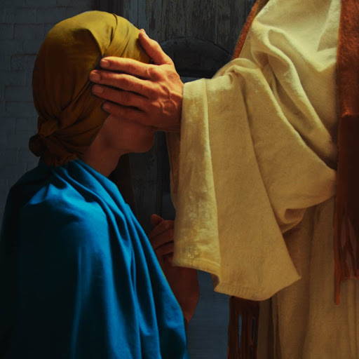 Painting of Jesus' hands curing a blind person. 