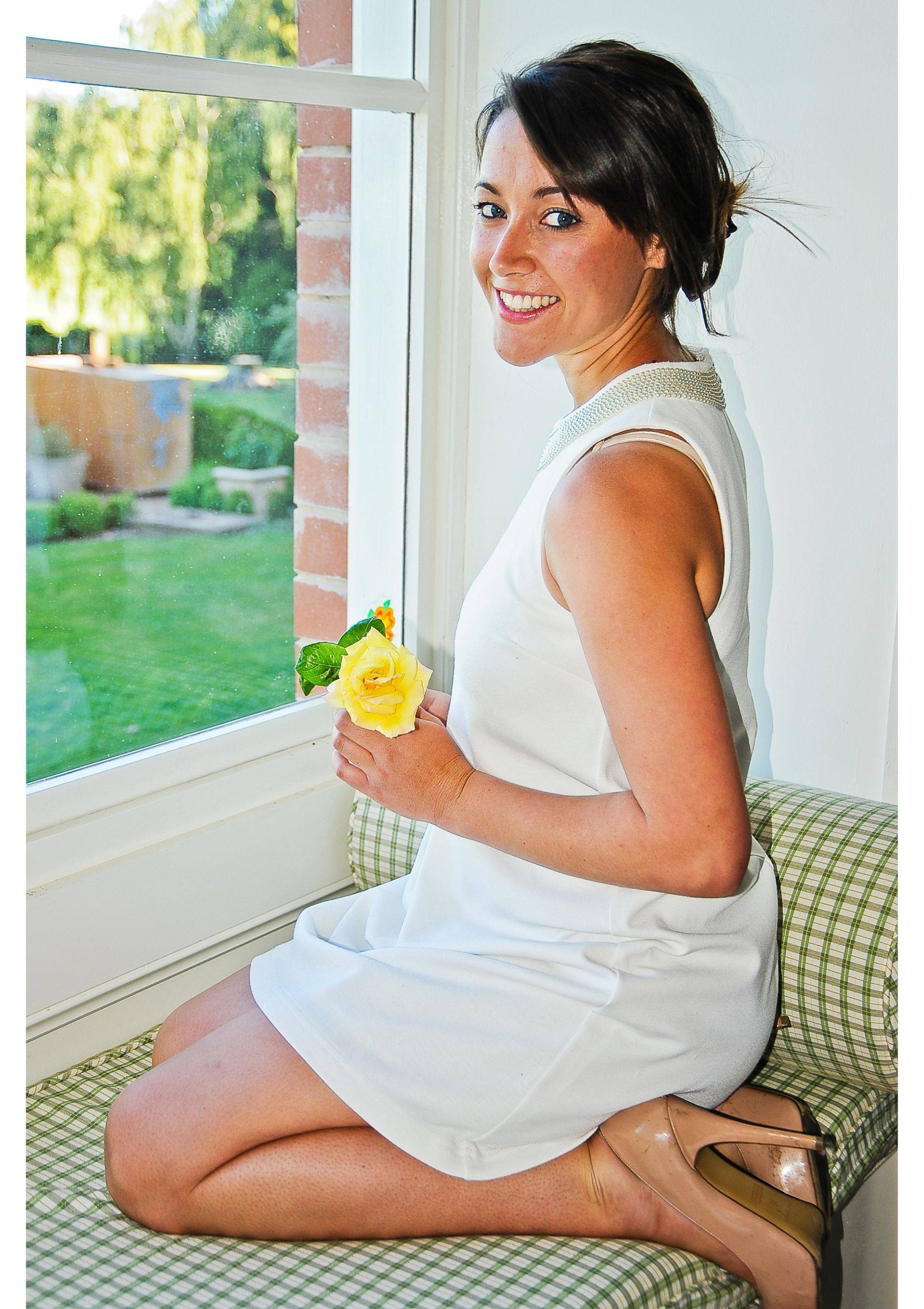 Jacqueline holding flowers