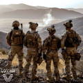 Military team looking out over a valley