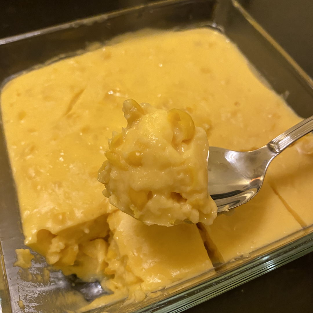 Trying out the creamy corn pudding