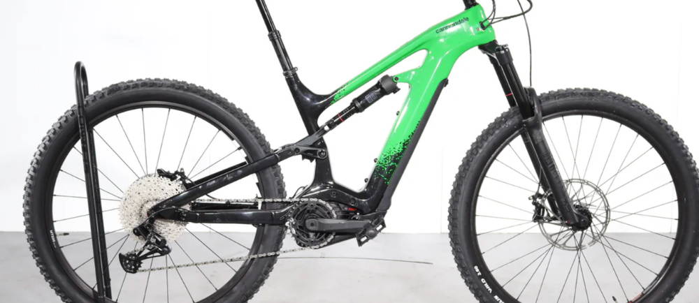a lime green Cannondale Moterra Neo Carbon 3 full suspension electric mountain bike