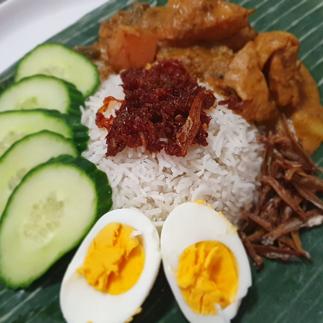 Tried the nasi lemak recipe with malaysian chicken curry and sambal. My boyfriend loved it!