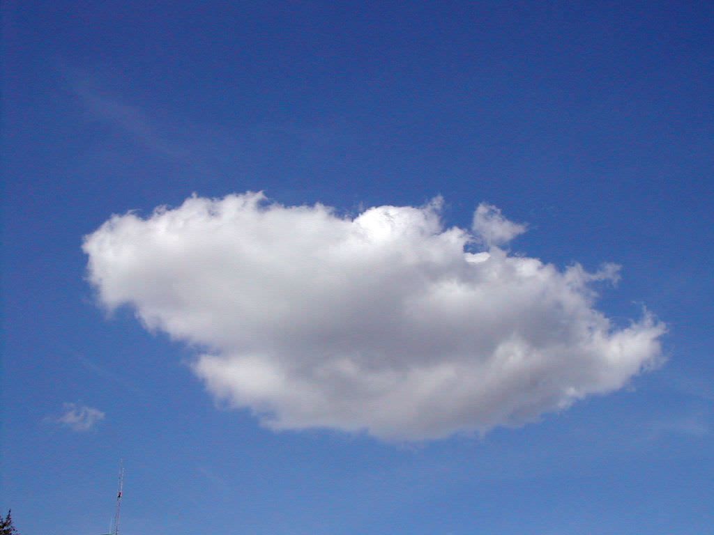 a cloud in a blue sky