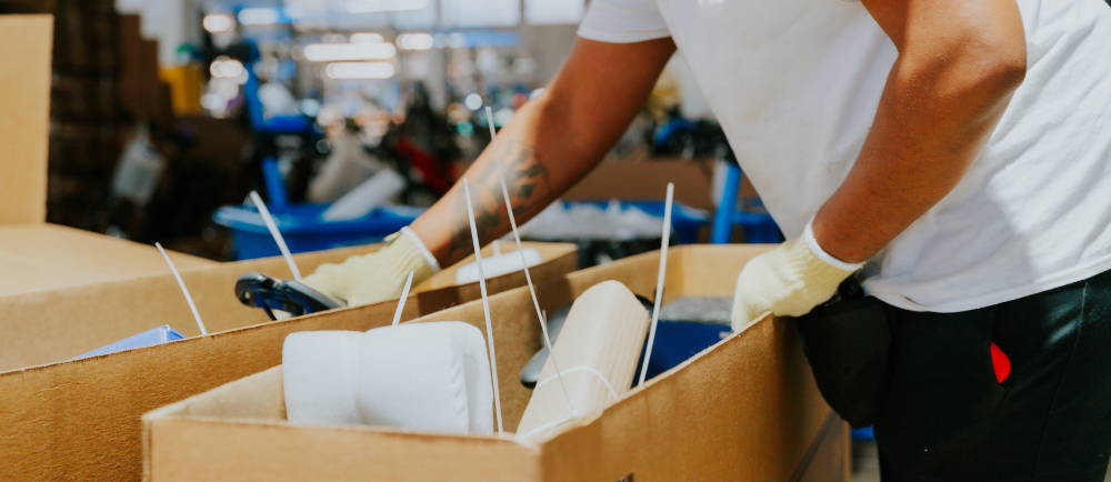 Upway worker with electric bike shipping box