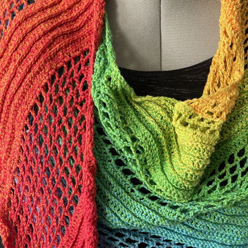 Crocheted rainbow dragon scarf