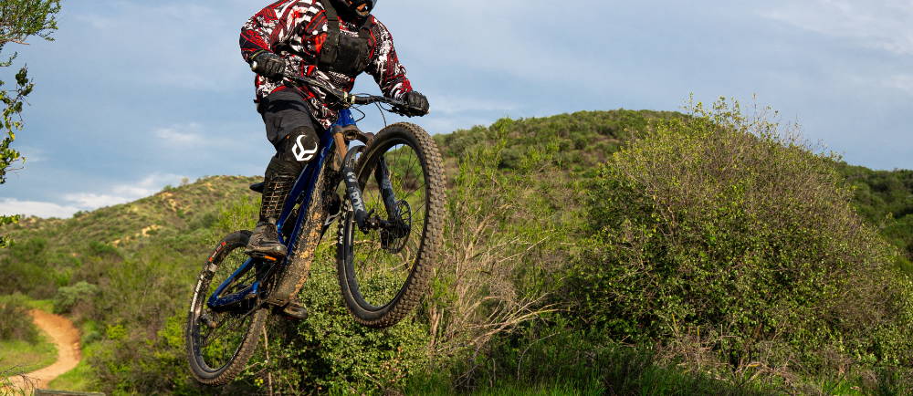 Mountain bike rider on a electric fat tire bike in the air