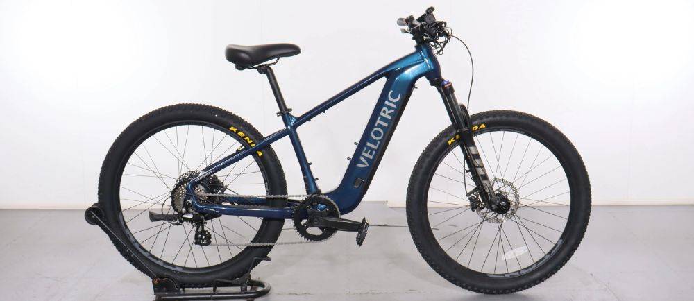 Velotric summit on a stand