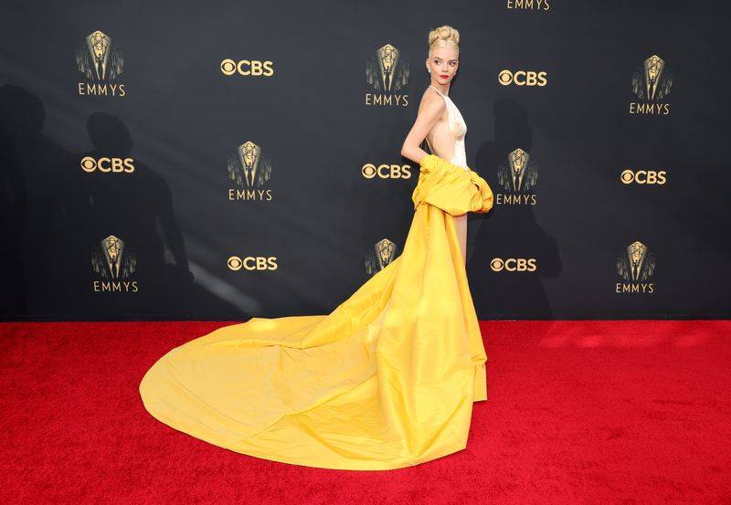 Image may contain: Anya Taylor-Joy, Fashion, Premiere, Red Carpet, Adult, Person, Wedding, Clothing, Dress, and Formal Wear
